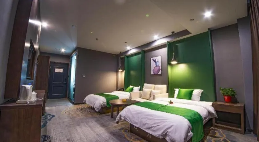 Bed in Shell Hotel Zhengzhou East High-Speed Railway Station Zhengdong Commerical Center