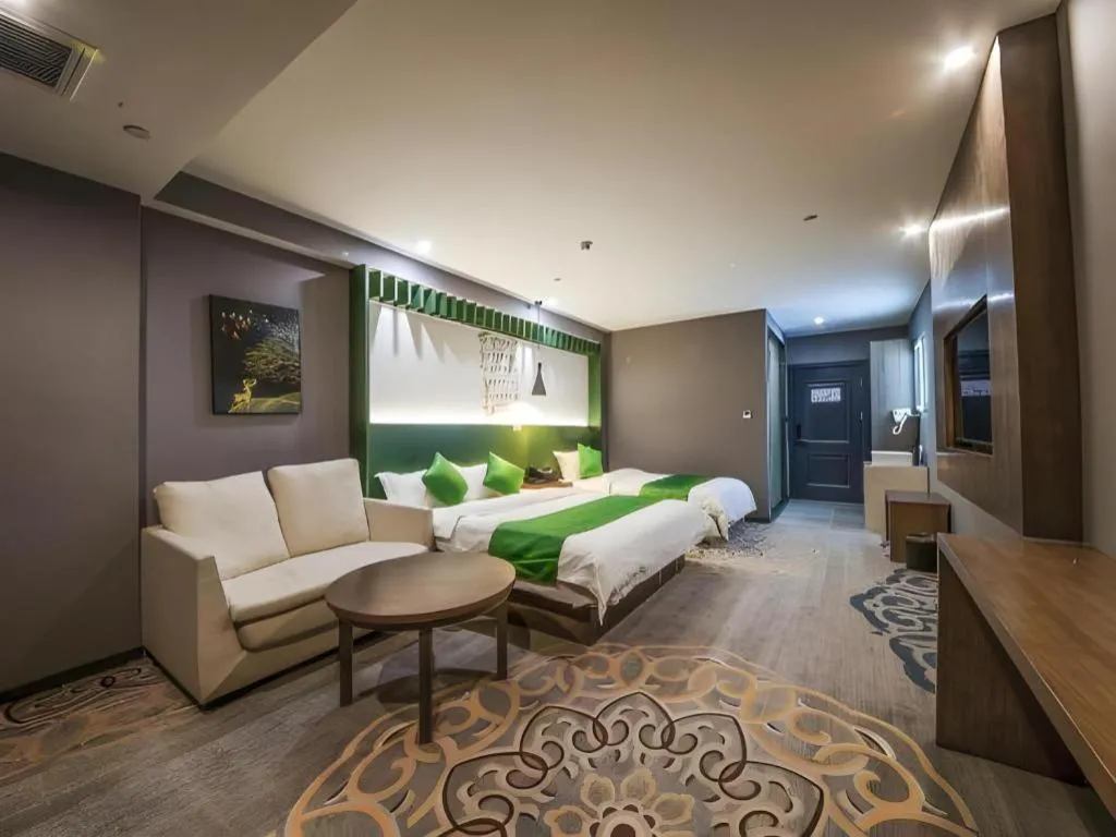 Bed in Shell Hotel Zhengzhou East High-Speed Railway Station Zhengdong Commerical Center