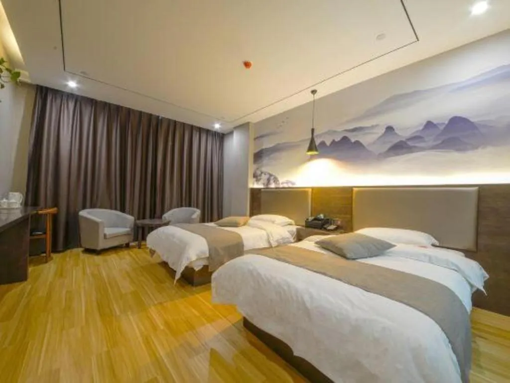 Bed in Shell Hotel Zhengzhou East High-Speed Railway Station Zhengdong Commerical Center