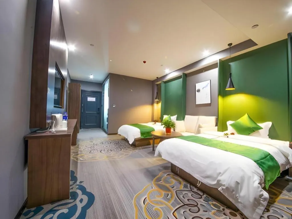 Bed in Shell Hotel Zhengzhou East High-Speed Railway Station Zhengdong Commerical Center