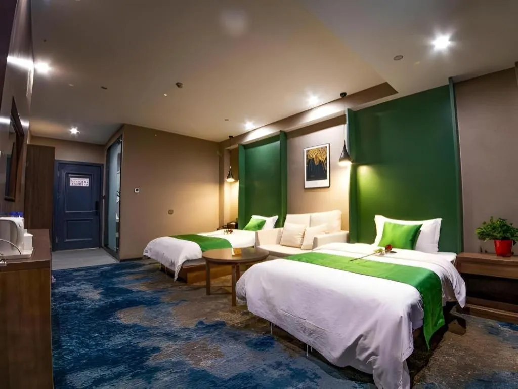 Bed in Shell Hotel Zhengzhou East High-Speed Railway Station Zhengdong Commerical Center