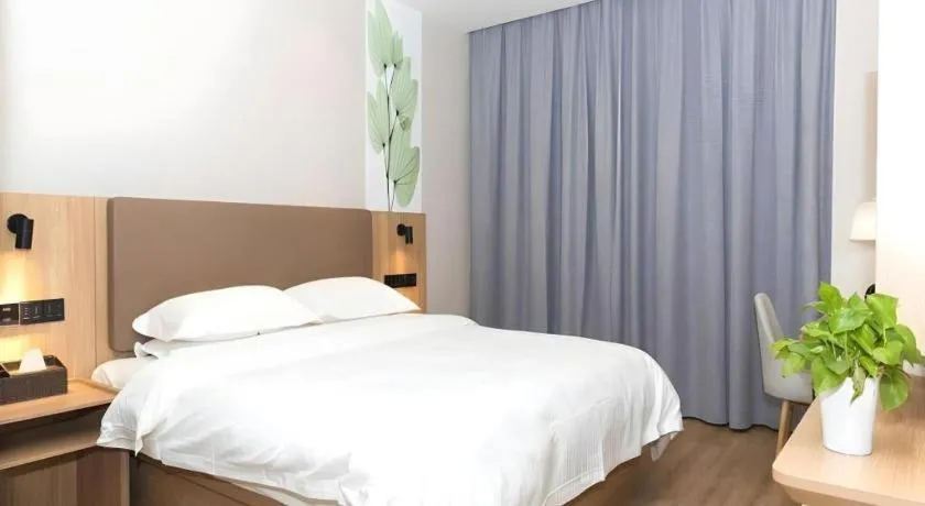 Bed in GreenTree Inn Hubei Yangxin County Lianhua Lake Mingyue Bay