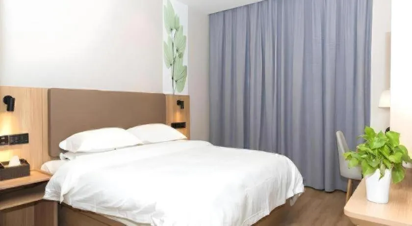 Bed in GreenTree Inn Hubei Yangxin County Lianhua Lake Mingyue Bay