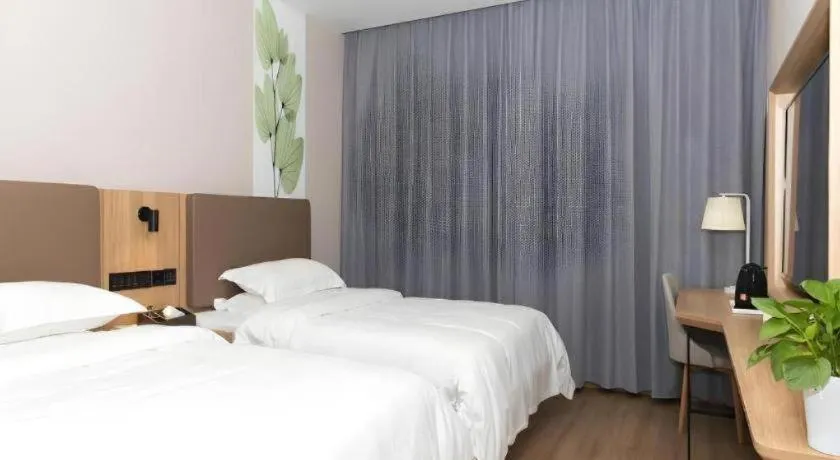 Bed in GreenTree Inn Hubei Yangxin County Lianhua Lake Mingyue Bay