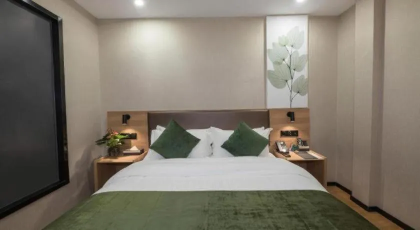 Bed in GreenTree Inn Express Zhangjiagang Hexing Town Shazhou Professional Institue of Technology