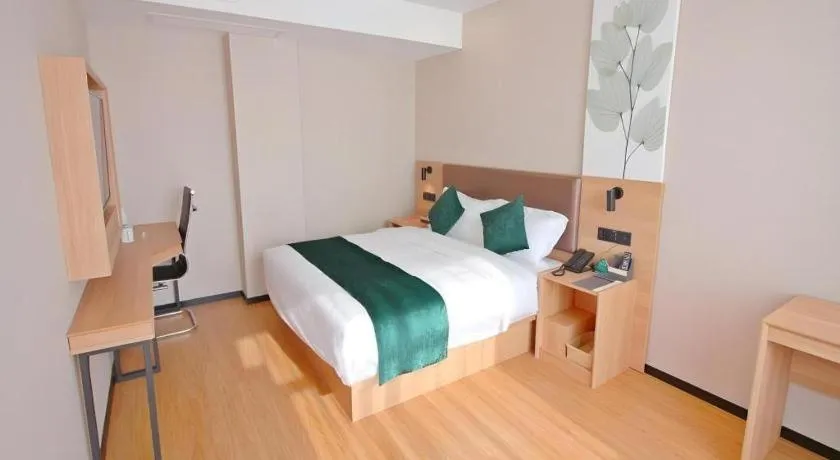 Bed in GreenTree Inn Express Zhangjiagang Hexing Town Shazhou Professional Institue of Technology