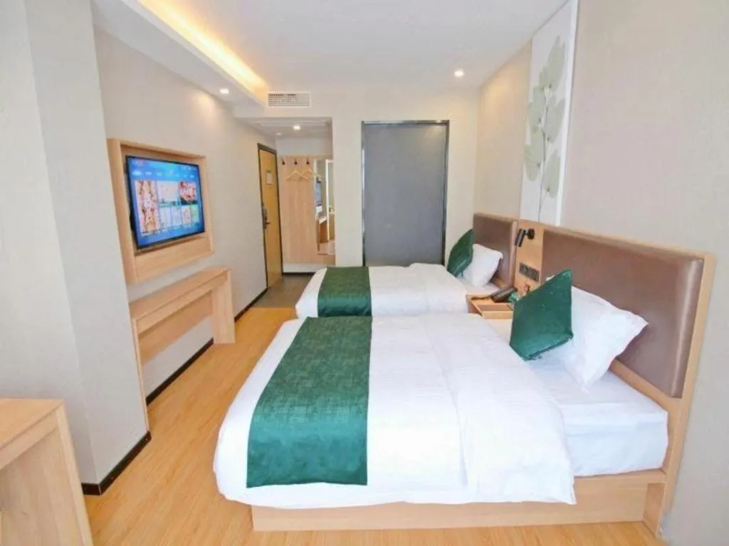 Bed in GreenTree Inn Express Zhangjiagang Hexing Town Shazhou Professional Institue of Technology