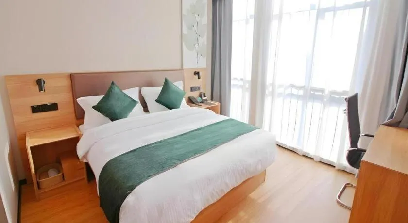 Bed in GreenTree Inn Express Zhangjiagang Hexing Town Shazhou Professional Institue of Technology