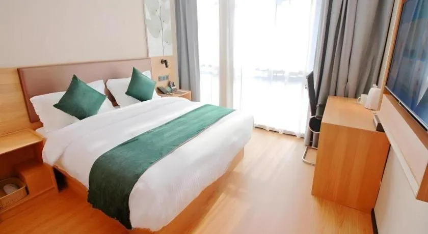 Bed in GreenTree Inn Express Zhangjiagang Hexing Town Shazhou Professional Institue of Technology
