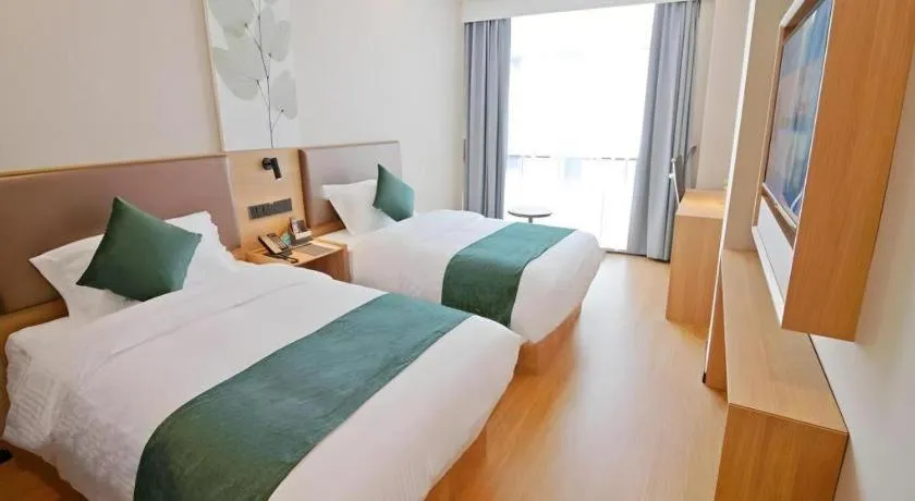 Bed in GreenTree Inn Express Zhangjiagang Hexing Town Shazhou Professional Institue of Technology