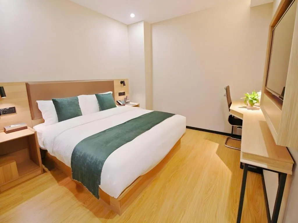 Bed in GreenTree Inn Express Zhangjiagang Hexing Town Shazhou Professional Institue of Technology