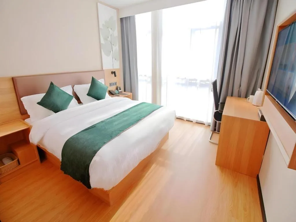 Bed in GreenTree Inn Express Zhangjiagang Hexing Town Shazhou Professional Institue of Technology