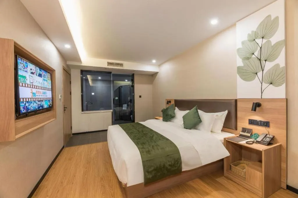 Bed in GreenTree Inn Express Zhangjiagang Hexing Town Shazhou Professional Institue of Technology