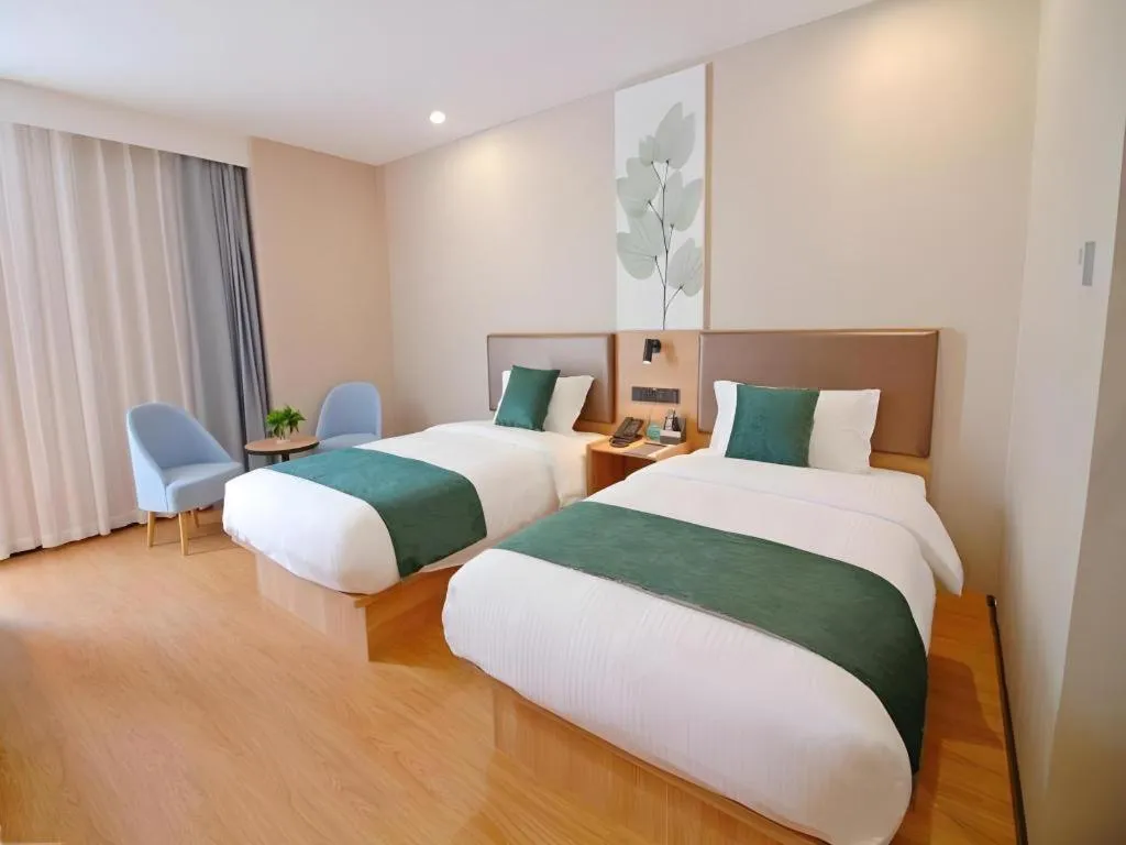 Bed in GreenTree Inn Express Zhangjiagang Hexing Town Shazhou Professional Institue of Technology