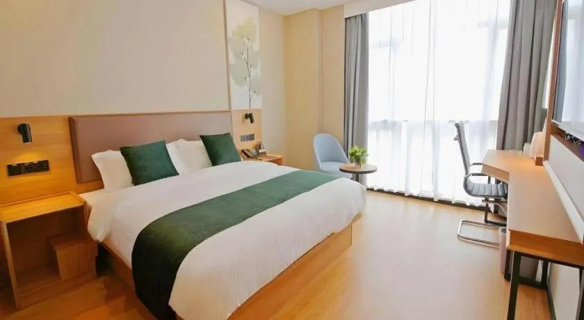 Bed in GreenTree Inn Express Zhangjiagang Hexing Town Shazhou Professional Institue of Technology
