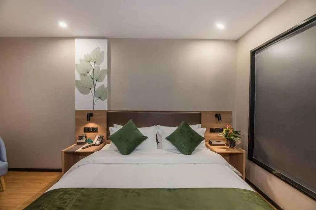 Bed in GreenTree Inn Express Zhangjiagang Hexing Town Shazhou Professional Institue of Technology