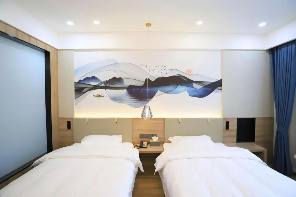 Bed in VX Hotel Jiangsu Taizhou Xinghua RT-Mart