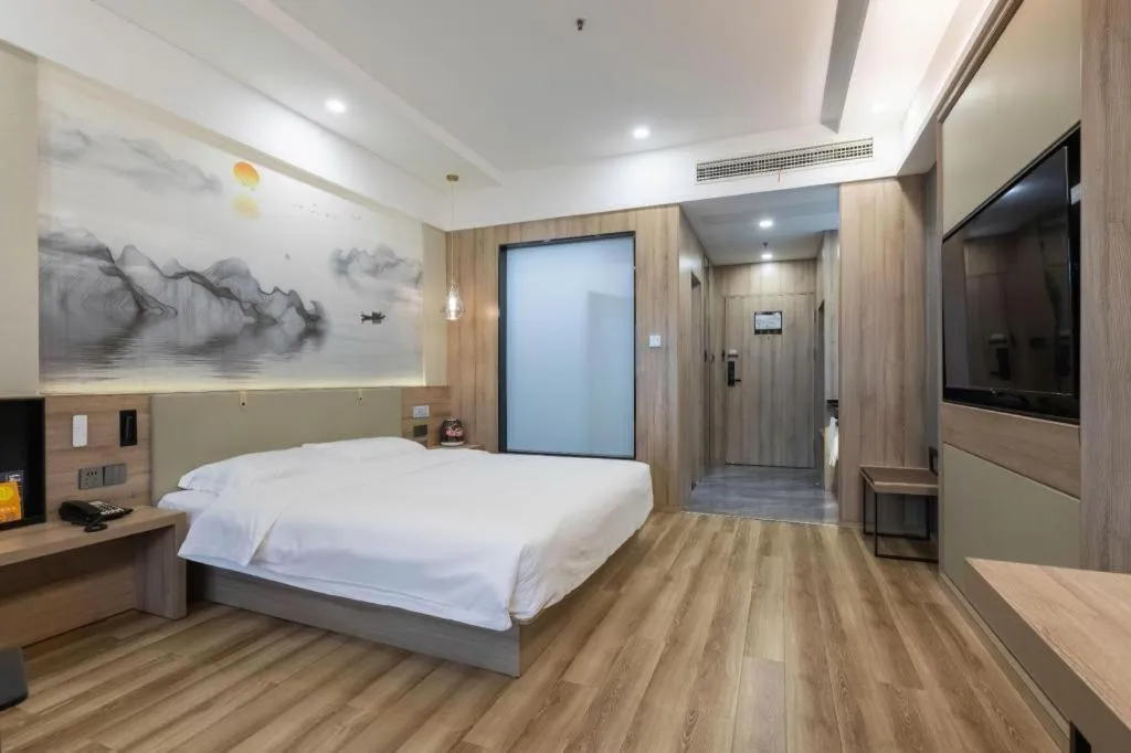 Bed in VX Hotel Jiangsu Taizhou Xinghua RT-Mart