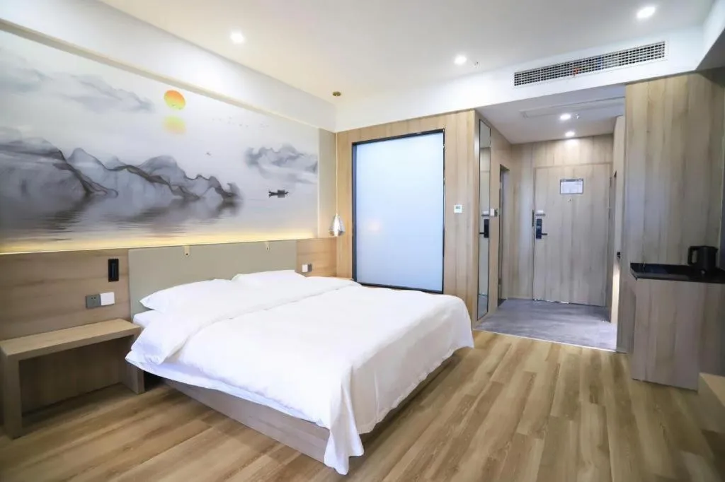 Bed in VX Hotel Jiangsu Taizhou Xinghua RT-Mart