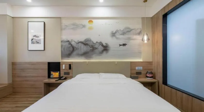 Bed in VX Hotel Jiangsu Taizhou Xinghua RT-Mart