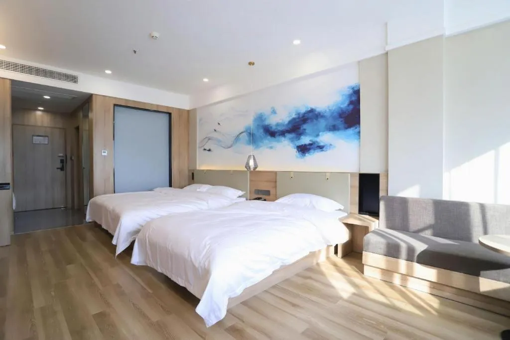 Bed in VX Hotel Jiangsu Taizhou Xinghua RT-Mart