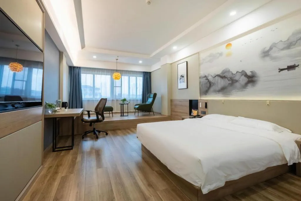 Bed in VX Hotel Jiangsu Taizhou Xinghua RT-Mart