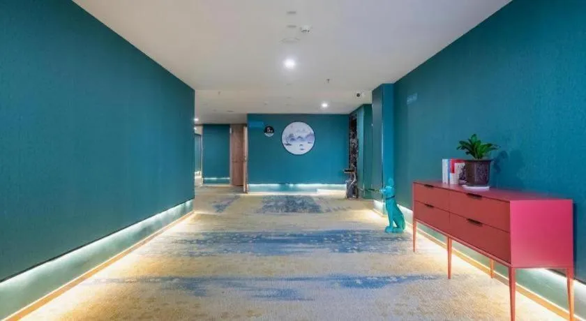 Bed in VX Hotel Jiangsu Taizhou Xinghua RT-Mart