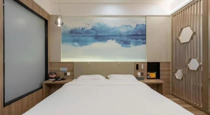 Bed in VX Hotel Jiangsu Taizhou Xinghua RT-Mart