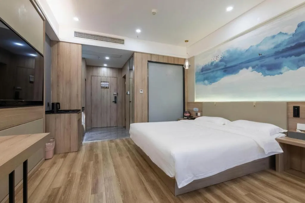 Bed in VX Hotel Jiangsu Taizhou Xinghua RT-Mart