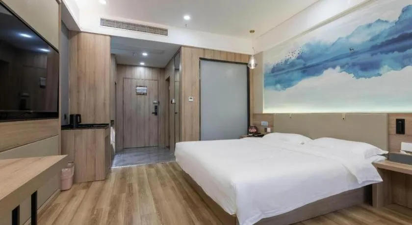 Bed in VX Hotel Jiangsu Taizhou Xinghua RT-Mart