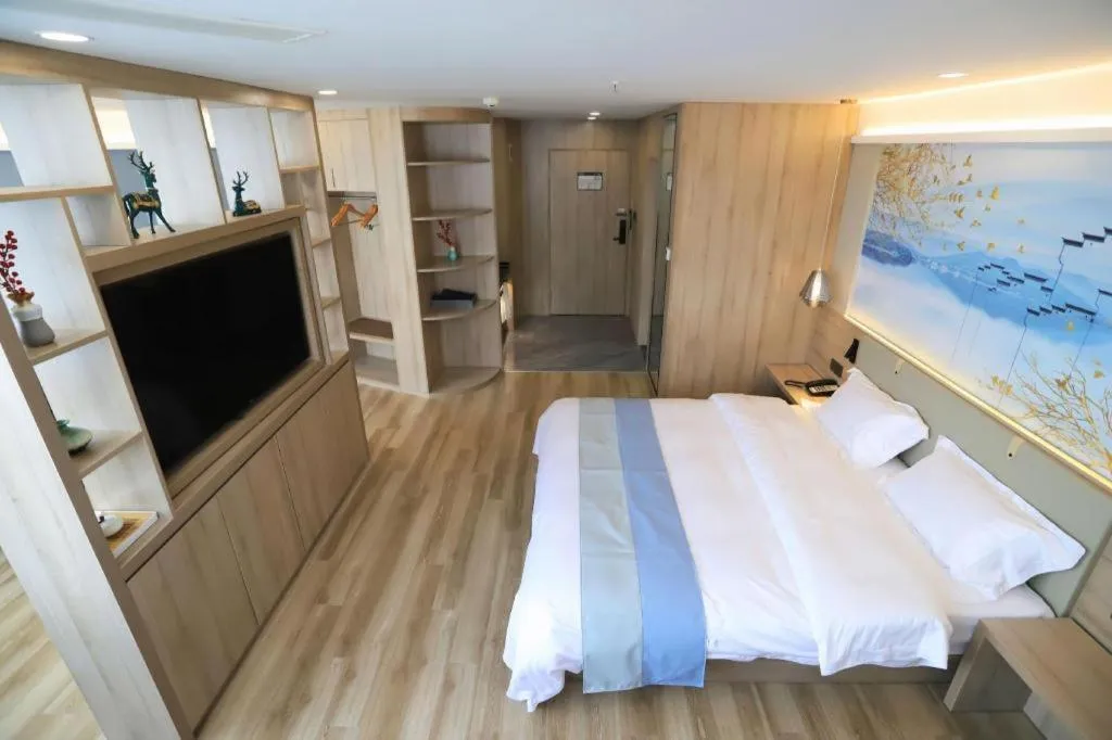 Bed in VX Hotel Jiangsu Taizhou Xinghua RT-Mart