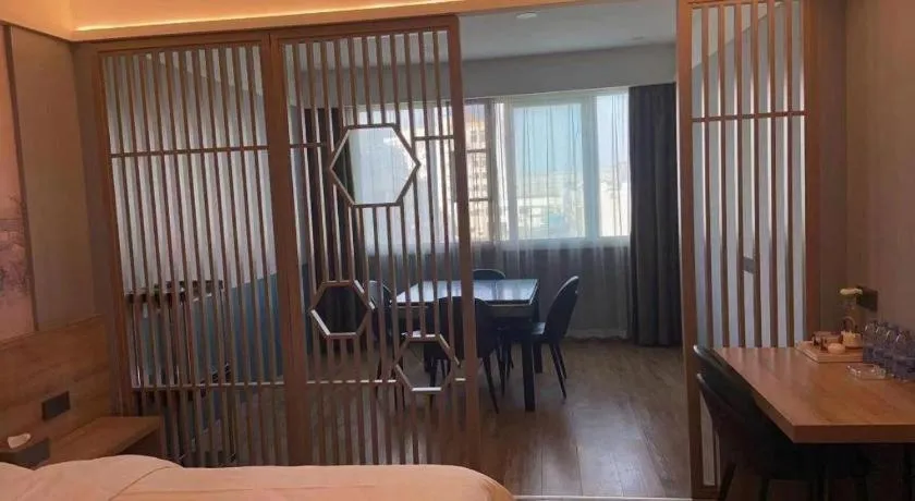 Bed in VX Hotel Jiangsu Taizhou Xinghua RT-Mart