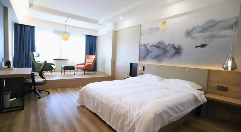 Bed in VX Hotel Jiangsu Taizhou Xinghua RT-Mart