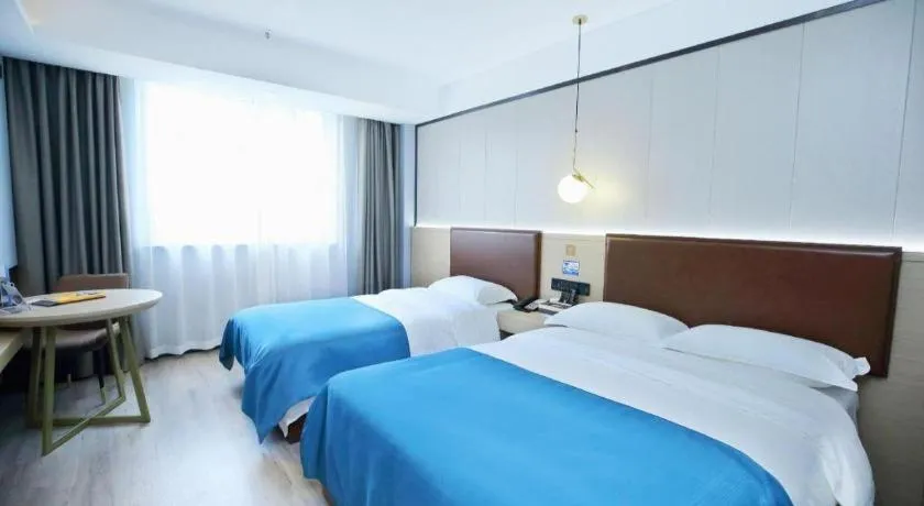 Bed in Gya Hotel Wuxi Hubin Commercial Street Tai Lake Scenic Area
