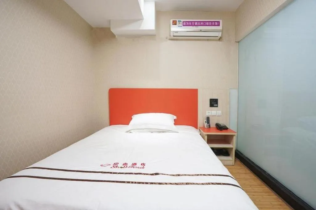 Bed in Shell Hotel Shanghai Expo Changqing Road Metro Station