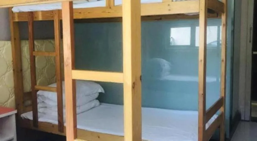 Bed in Shell Hotel Shanghai Expo Changqing Road Metro Station