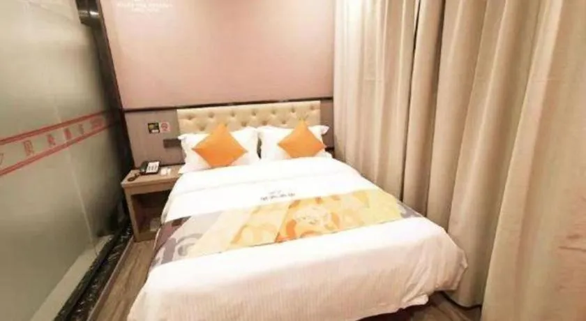 Bed in Shell Hotel Shanghai Jinshan Wanda Plaza