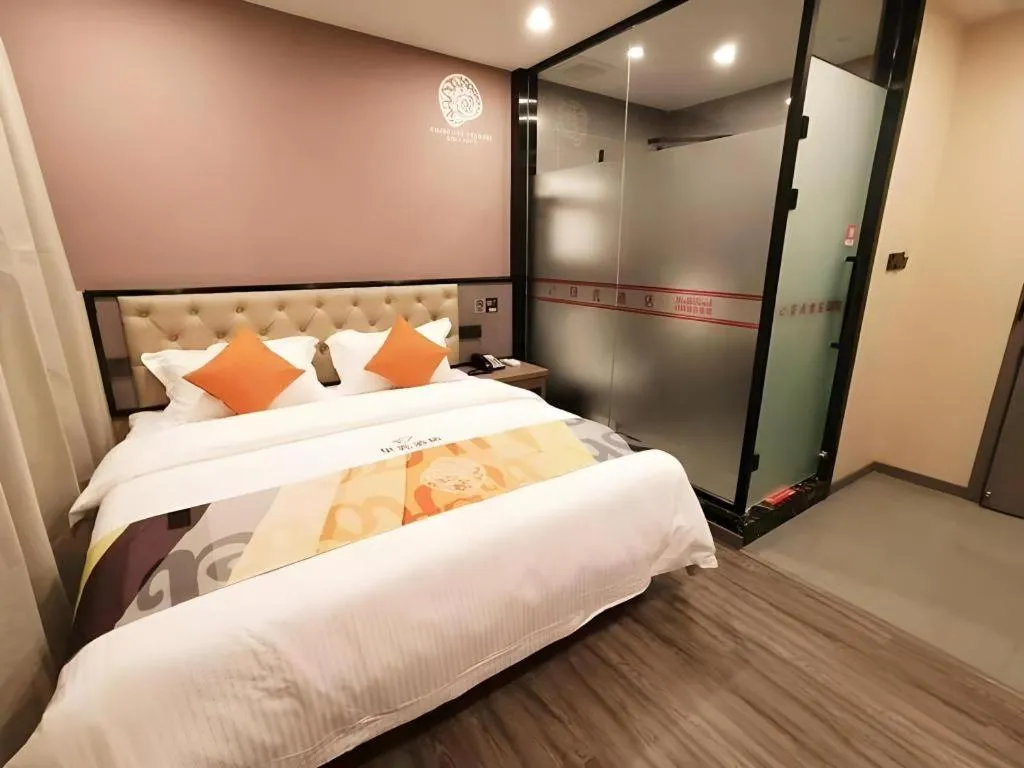 Bed in Shell Hotel Shanghai Jinshan Wanda Plaza