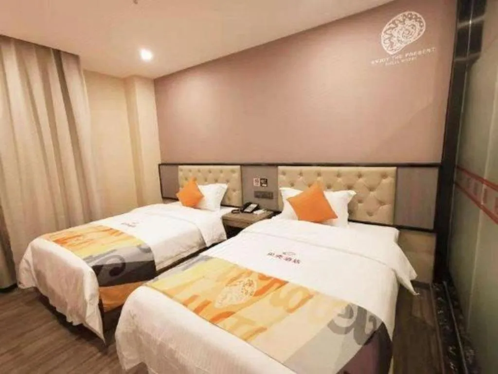 Bed in Shell Hotel Shanghai Jinshan Wanda Plaza