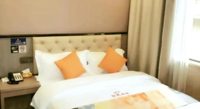 Bed in Shell Hotel Shanghai Jinshan Wanda Plaza