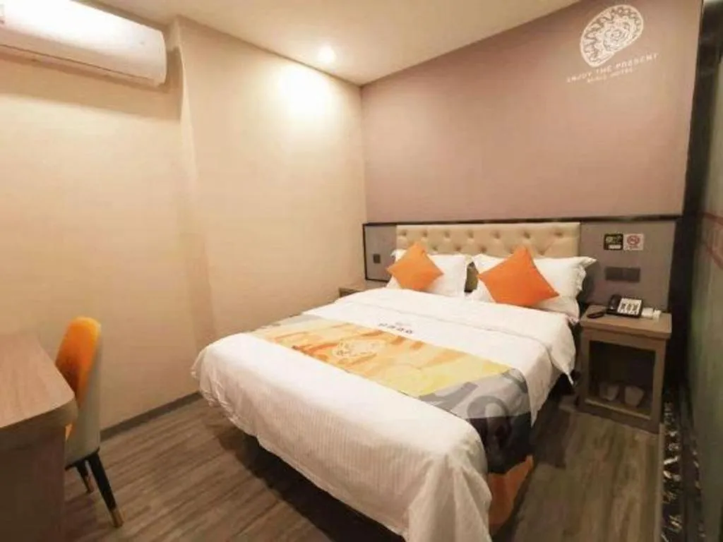 Bed in Shell Hotel Shanghai Jinshan Wanda Plaza