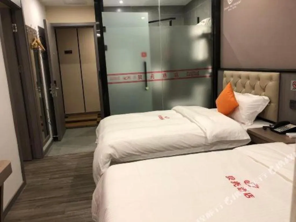 Bed in Shell Hotel Shanghai Jinshan Wanda Plaza
