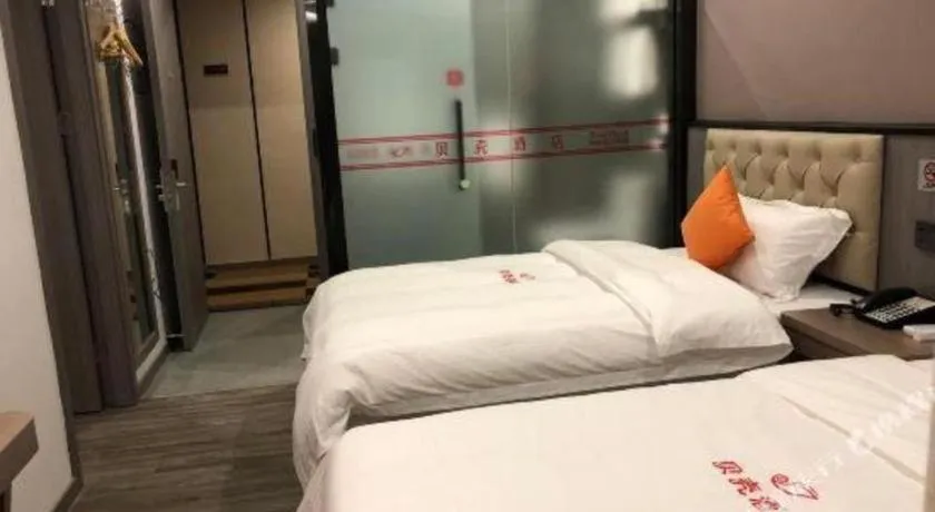 Bed in Shell Hotel Shanghai Jinshan Wanda Plaza
