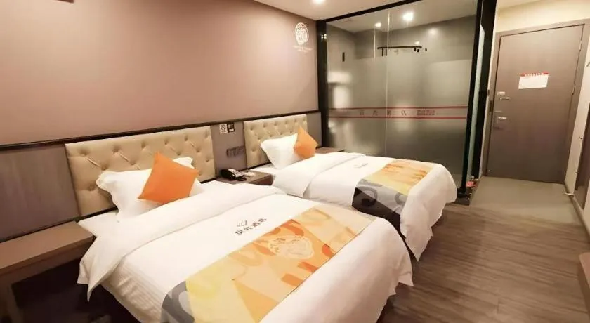 Bed in Shell Hotel Shanghai Jinshan Wanda Plaza