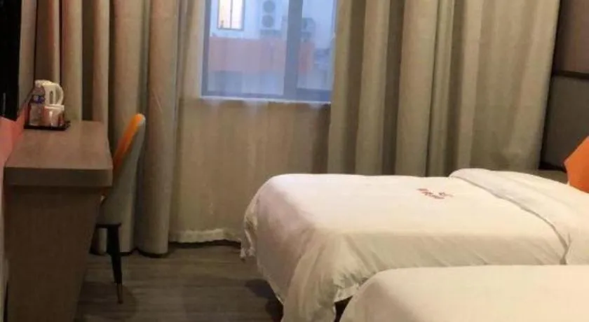 Bed in Shell Hotel Shanghai Jinshan Wanda Plaza