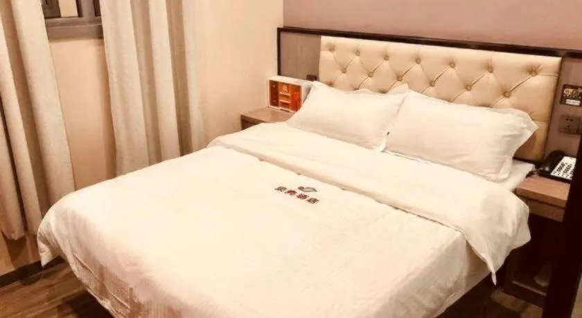Bed in Shell Hotel Shanghai Jinshan Wanda Plaza
