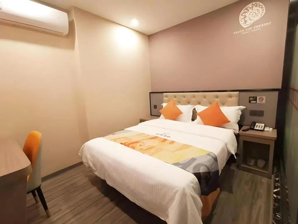 Bed in Shell Hotel Shanghai Jinshan Wanda Plaza