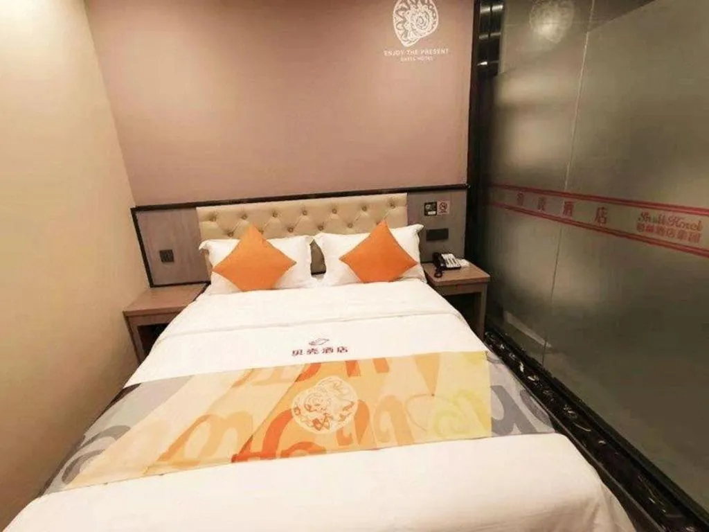 Bed in Shell Hotel Shanghai Jinshan Wanda Plaza