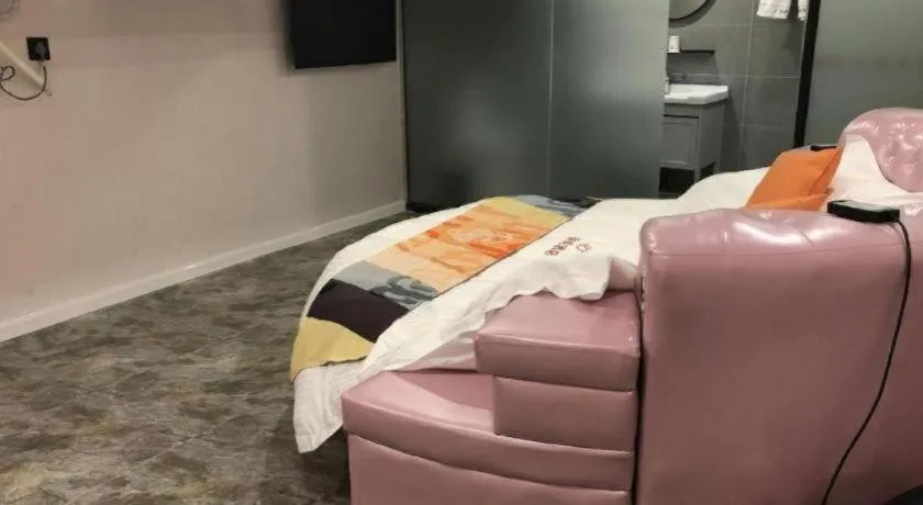 Bed in Shell Hotel Shanghai Jinshan Wanda Plaza