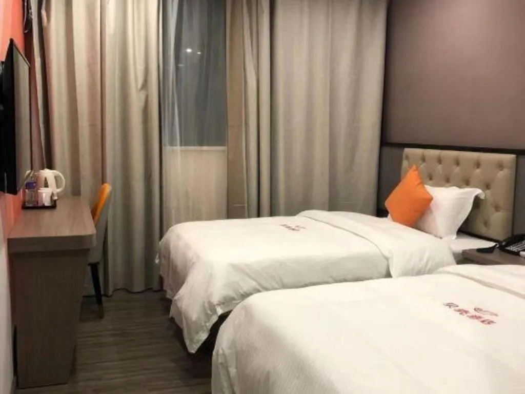 Bed in Shell Hotel Shanghai Jinshan Wanda Plaza